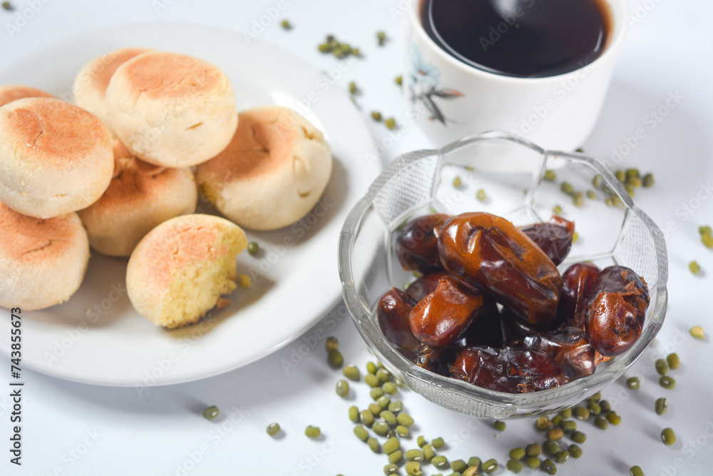 Typical snack from Java, Indonesia. Bakpia filled with nuts, black coffee and dates Typical snack from Java, Indonesia. Bakpia filled with nuts, black coffee and dates
