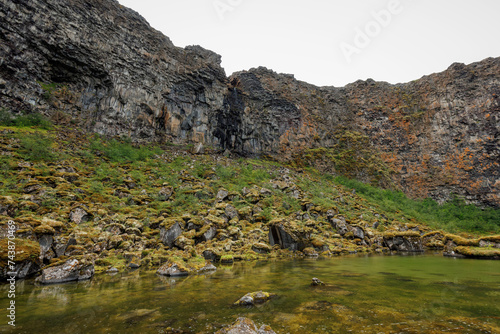 Asbyrgi Canyon, or the Shelter of the Gods, a magical place and natural attraction in Iceland. Natural wonders tours concept. photo