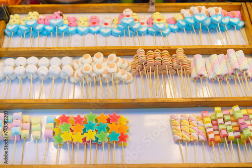Colorful Candy Skewers at a Market Stall