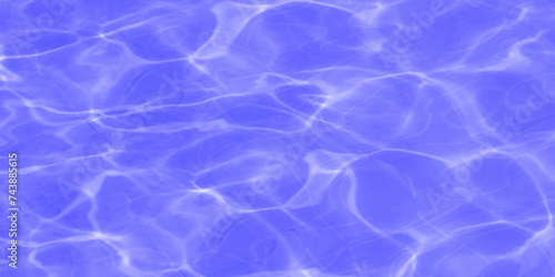 Modern Vivid deep blue water background. Transparent water in pool. Blue water with ripples on the surface. Defocus blurred blue water shining in the sea. rippled water detail background. 