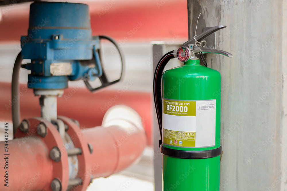 Naklejka premium green tank of fire extinguisher