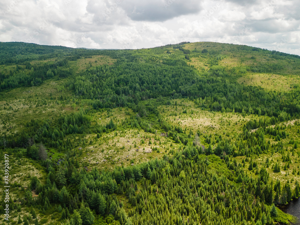 Fototapeta premium St-Urbain, Canada - July 17 2023: Panorama arial view in Grands Jardins National Park in Quebec 