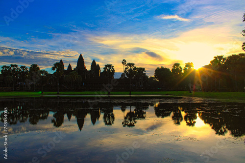 Rising sun over wolrd famous heritage of Angkor Wat in Cambodia photo