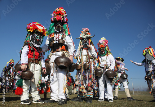 People called Kukeri parade in masks and ritual costumes, perform ritual dances to drive away evil spirits in the town of Elin Pelin, Bulgaria.