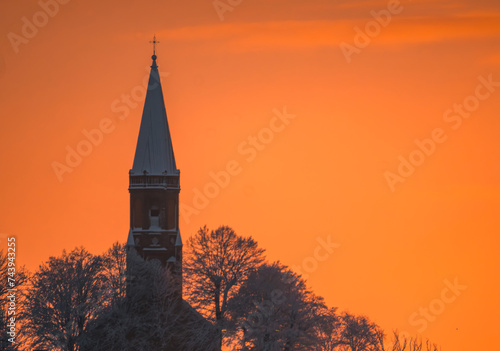 sunrise over the church tower