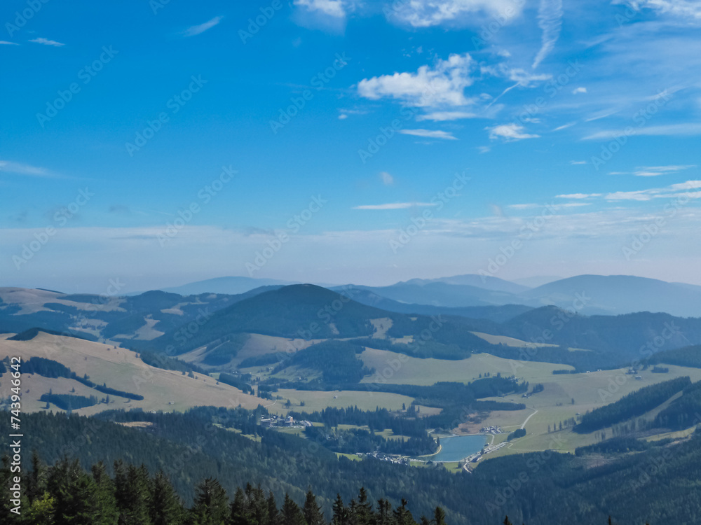 On top of majestic mountain peak Hochlantsch with panoramic view of lake at Teichalm, Graz Highlands, Prealps East of the Mur, Styria, Austria. Wanderlust Austrian Alps. Hiking trail in alpine nature On top of majestic mountain peak Hochlantsch with panoramic view of lake at Teichalm, Graz Highlands, Prealps East of the Mur, Styria, Austria. Wanderlust Austrian Alps. Hiking trail in alpine nature