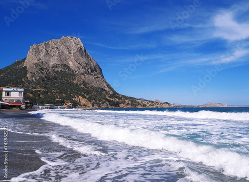 Beautiful landscape seacost with rocks at the sunny day new world long exposure