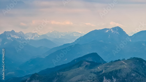 On top of Feistritzer Spitze (Hochpetzen) with panoramic view of majestic mountain peaks Karawanks and Julian Alps, Carinthia, border Austria Slovenia. Hiking trail Petzen, Bleiburg, Völkermarkt