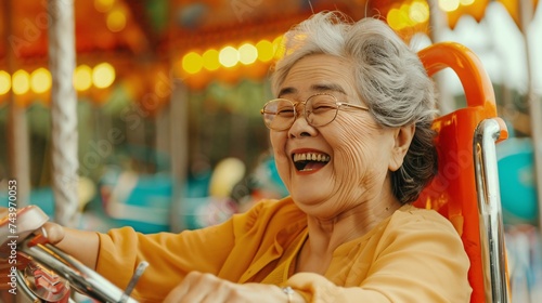 Senior woman laughing as she spends time at the amusement park