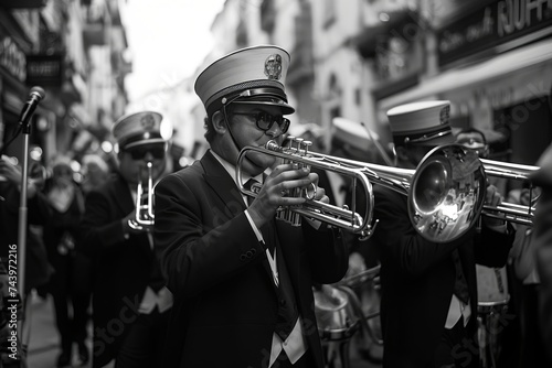 A man dressed in a formal suit playing a trumpet with skill and passion  showcasing his musical talent in a lively performance