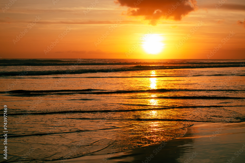 Golden sunset on the beach in Bali