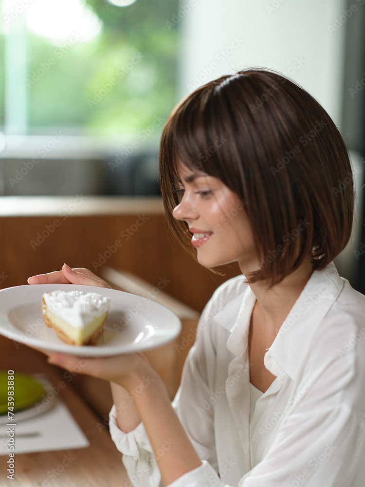 Romantic Dinner for Two A Beautiful Woman Enjoying a Homemade Meal at a Stylish Dining Table Romantic Dinner for Two A Beautiful Woman Enjoying a Homemade Meal at a Stylish Dining Table