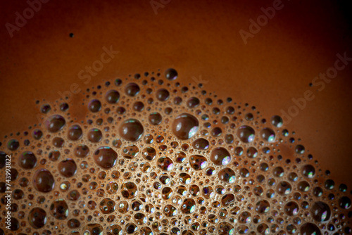 Close up view of foam on surface of coffee