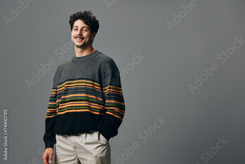 Man copyspace fashion portrait trendy smile face handsome standing joyful positive hipster sweater caucasian © SHOTPRIME STUDIO