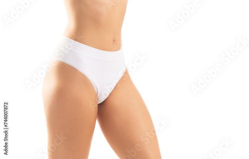 Young, fit and beautiful woman in white swimsuit over white background. The concept of healthcare, diet, sport and fitness.