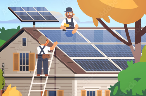 Workers install solar panels on the roof of house. Service for green technologies