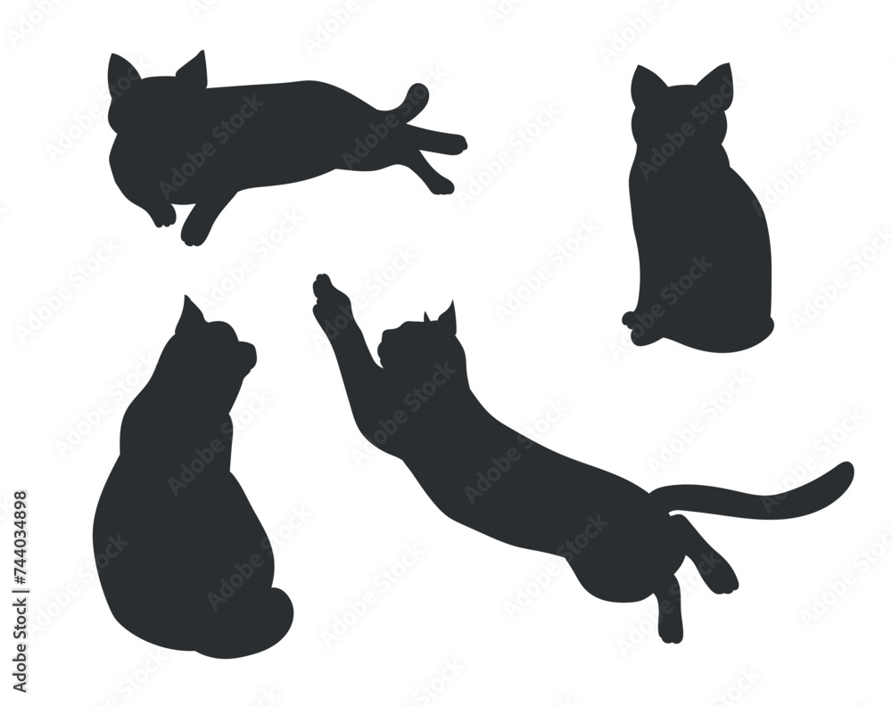 Set of silhouettes of cats in different poses. Vector illustration