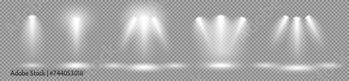 A set of spotlights, lighting the stage with white light from lighting fixtures on a gray background. Bright lighting with floodlights. Vector light sources. The light from the spotlight. Vector EPS