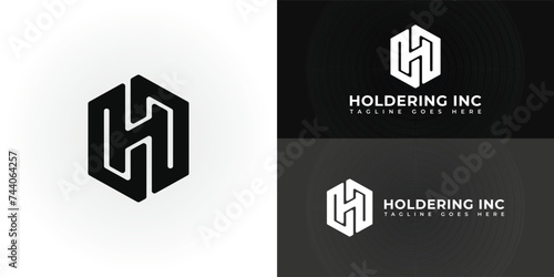 Abstract initial letter HI or IH logo in black color isolated in black and white backgrounds applied for technology company logo also suitable for the brands or companies have initial name IH or HI.