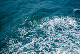 Blue coloured sea surface, colourful background image of ocean 