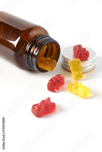 vitamins in gummy shape on white background photo