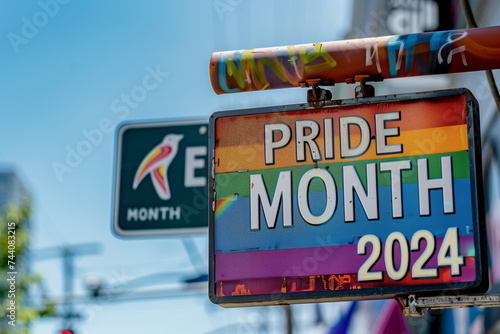 Secret message at the street: It's pride month art deco or retro style sign at the street as a cinema premiere traffic sign or shop sign photo