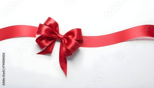 red ribbon with bow on white background, free space