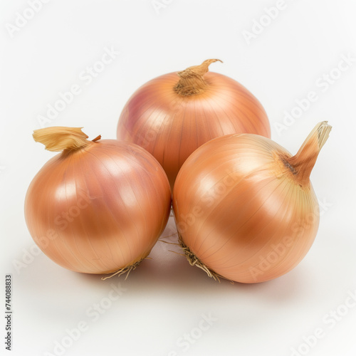 Wallpaper Mural A close-up image of three fresh, glossy yellow onions, isolated on a pure white background. Torontodigital.ca