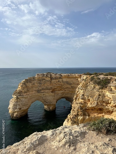 Rocky coastline, ocean horizon, rocks at the ocean, cliffs