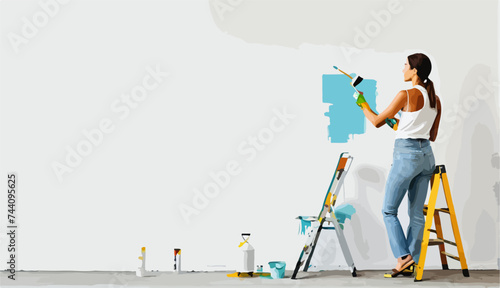 Una mujer pintando una pared