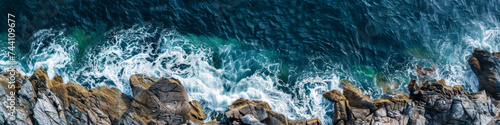 Aerial View of Sea Waves Crashing on Rocky Shore