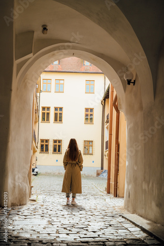 A girl in front of a famous landmark in Prague, Czech Republic
 photo