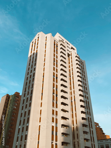 Medellin, Antioquia, Colombia. February 19, 2024: The Marco Fídel Suárez Residential Unit, better known as “the Towers of Bomboná and blue sky.