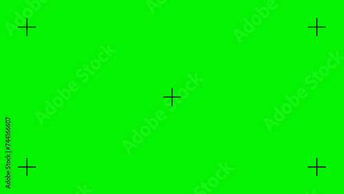 Green screen motion tracking markers. Chroma key color video footage. VFX