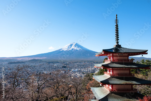 Mont Fuji beautiful landscape view from Chureito Pagoda during autumn with colorful maple leaves (momiji), in Japan
