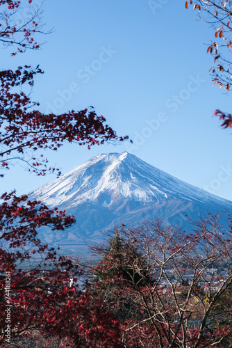 Mont Fuji beautiful view from Fujiyoshida in autumn with colorful maple leaves (momiji), Japan

