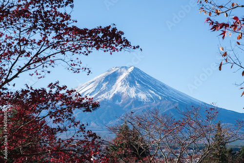Mont Fuji beautiful view from Fujiyoshida in autumn with colorful maple leaves (momiji), Japan
