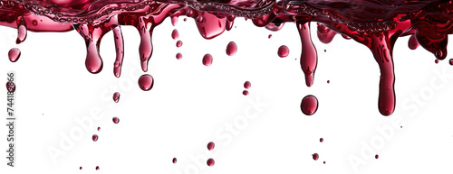 Red wine dripping over white transparent background photo