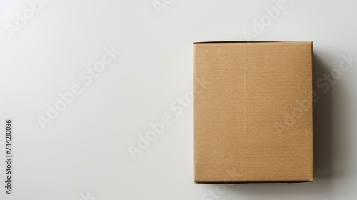 Carton box isolated on white background to be used for mockup projects. © Jalal