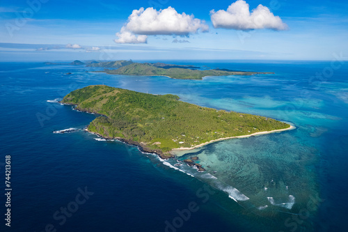 Coral reef from above - Aerial view of healthy coral reef and tropical Island in the South Pacific - Fiji