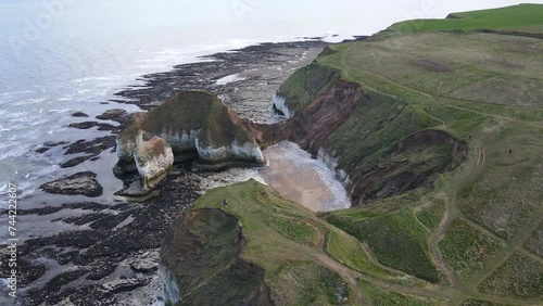 Aerial view of the stunning white chalk cliffs of North Landing at Flamborough on the East Yorkshire coast of the UK.