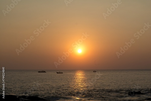 Golden Horizons: Gokarna's Sunset Seascapes