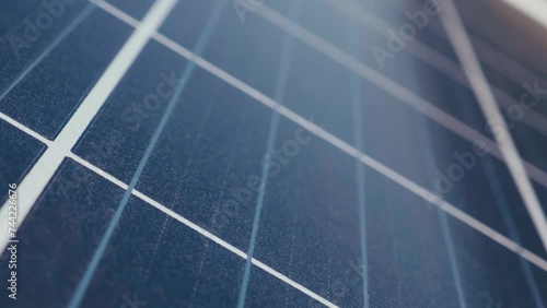 Photovoltaics solar panels in a solar park close up. Solar panels on sunny day. Solar panels system power generators. Alternative power energy concept.