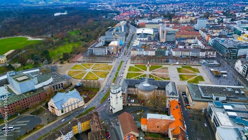 Aerial around the downtown of the city Kassel in Hessen, Germany on a cloudy day in early spring. 