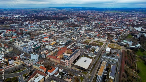 Aerial around the downtown of the city Kassel in Hessen  Germany on a cloudy day in early spring 