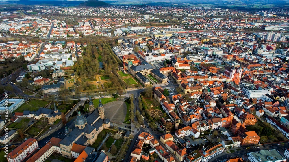Aerial around the old town of the city Fulda in Hessen Germany on a sunny day in spring