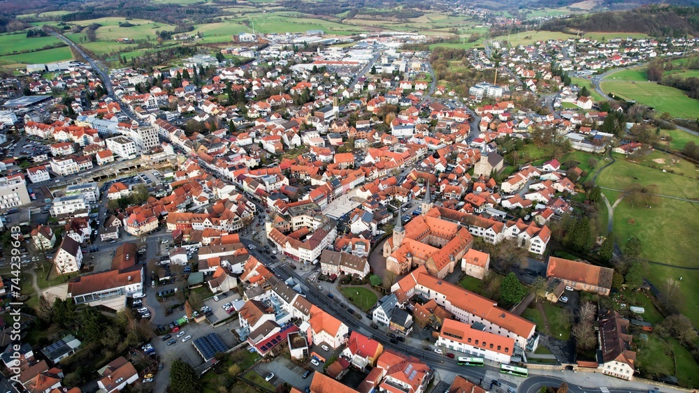 Aerial view around the old town of Schluchtern on a sunny day in fall