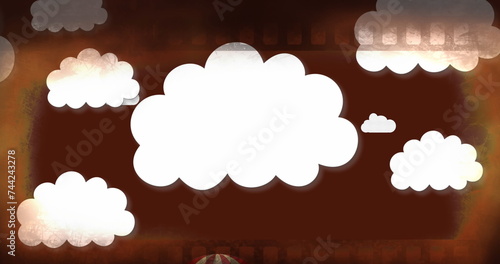 Image of clouds and hot air balloon over grey background