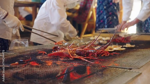 Japanese Spiny Lobsters Being Grilled by Ama Divers in Osatsu Seaside Hut, Toba photo