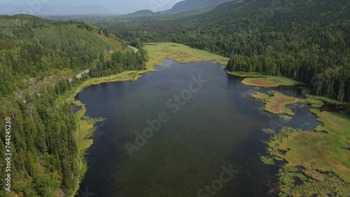 Seeley Lake Provincial Park Aerial Views with an Pull Out Dolly Shot Across the Water in Smithers, Canada. photo
